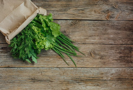 fresh vegetables set left side on wooden background right empty place for inscription
