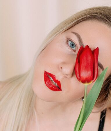 girl flowers beauty cosmetics body skin care freshness aroma floral red tulipの写真素材