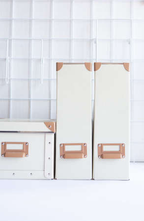 table and chairs in cafe outside park trees autumn golden fallen leavesの写真素材