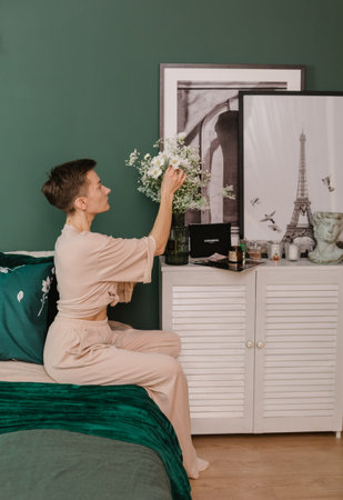 woman in pajamas spring concept home interior green style parisの写真素材