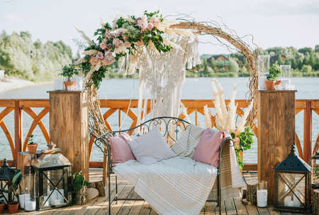wedding decor flowers postcard venue of the ceremony outside riverbank without peopleの写真素材