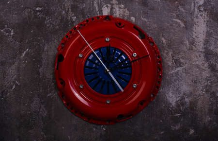 homemade loft style clock made of car parts piston clutch basketの写真素材