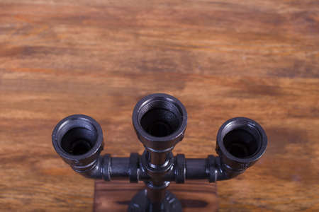 candlestick for three candles metal loft style and gold candles design interiorの写真素材