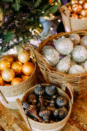 Christmas decor in baskets tangerines cones and decorations for the Christmas treeの写真素材