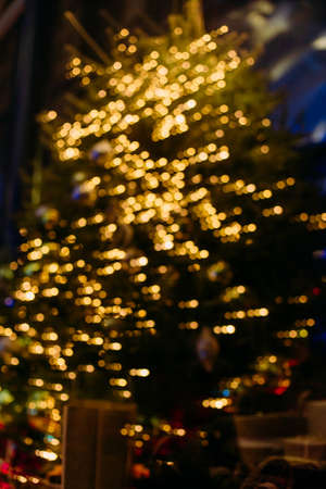 christmas tree garland blurred background bokeh new year decorationの写真素材