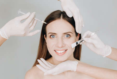 cosmetic procedures with the face of a beautiful girl full service joy satisfactionの写真素材