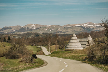 settlement in the mountains countryside in a valley at the foot of the mountains beautiful landscapeの写真素材