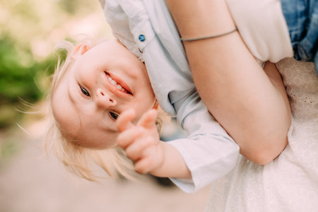 child and family together love hold hands fun and relaxation
