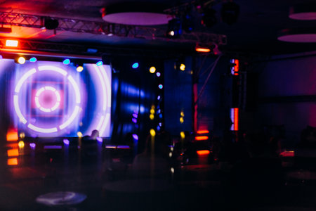 colorful illuminated stage blurred background conceptual concert nightclubの写真素材