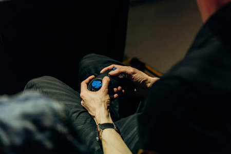 man with a joystick in his hands control game direction speed