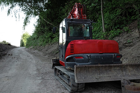 crawler excavator with bucket and other attachments road work repair excavation