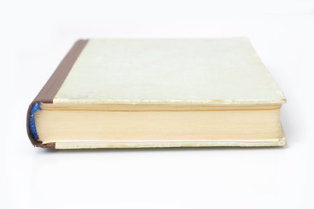 closed gray old book spineの写真素材