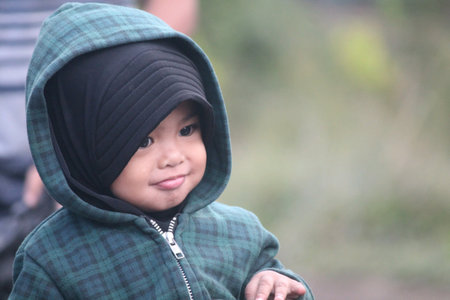 1 years old children on mount buthak, batu, indonesiaの素材