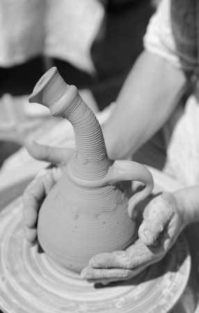 Jug production on a potter's wheelの写真素材