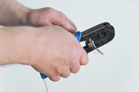 Cutting wires. Crimp tool rj45 connector on a white background
