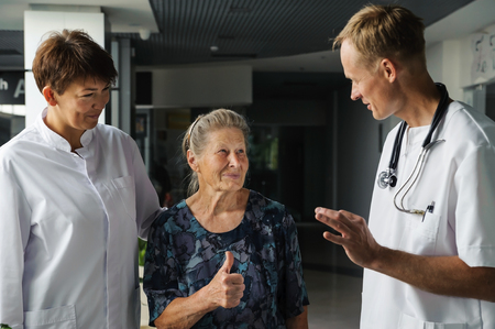 Doctors interested in the elderly patient as his healthの写真素材