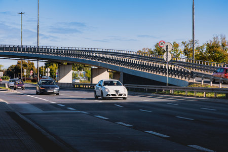 Cars are moving on the freeway and the road junction.の写真素材