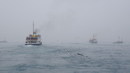 Foggy morning in Istanbul early hours of passenger steamers, in dense fog journey.のeditorial素材