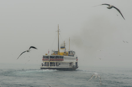 Foggy morning in Istanbul early hours of passenger steamers, in dense fog journey.のeditorial素材