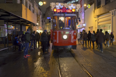 Istanbul, Turkey - September 21, 2012: the former tram on Istiklal Street in Istanbul, Taksim-Tunel carry passengers. A cold winter day.のeditorial素材