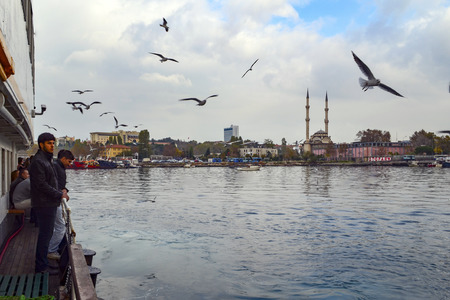 Istanbul, Turkey - December 18, 2012: Kadikoy pier. Protocol Haydarpasa Mosque in the background.Haydarpasa Protocol Cami.1873 year the mosque was destroyed in the construction of railways in 1982, it was rebuilt in the baroque and Ottoman style. The mosqのeditorial素材