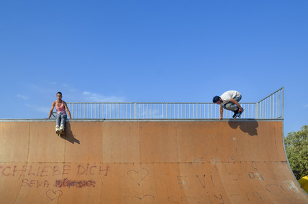 Istanbul, Turkey - June 4, 2016: Avcilar Skatepark. In the area of 2000 square meters skatepark, young skaters under the blue sky seems almost like flying.のeditorial素材