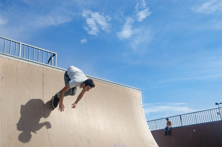 Istanbul, Turkey - June 4, 2016: Avcilar Skatepark. In the area of 2000 square meters skatepark, young skaters under the blue sky seems almost like flying.のeditorial素材