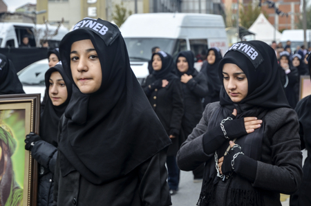 Istanbul, Turkey - November 3, 2014: Universal Ashura Mourning Ceremony. Mourne ashura. Universal Day of Ashura Ceremony, was held in Istanbul to commemorate the martyrdom of Husain ibn Ali, the grandson of the Prophet Muhammad and his 71 friends.のeditorial素材