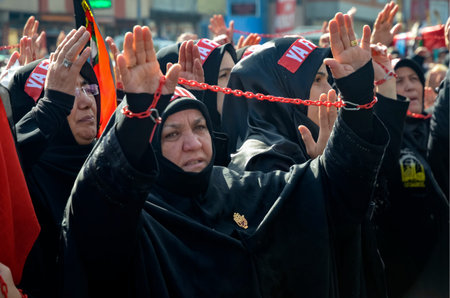 Istanbul, Turkey - November 3, 2014: Universal Ashura Mourning Ceremony. Mourne ashura. Universal Day of Ashura Ceremony, was held in Istanbul to commemorate the martyrdom of Husain ibn Ali, the grandson of the Prophet Muhammad and his 71 friends.のeditorial素材