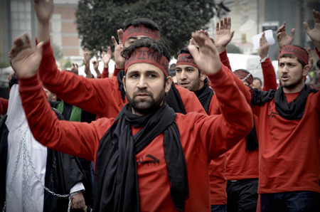 Istanbul, Turkey - November 13, 2013: The global mourning ceremony of Ashura. Karbala Martyrs Commemoration in Arenamega. Thousands of Jaferies in Turkey joined the Karbala mourning ritual where Prophet Muhammad's grandson Imam Hussain and 72 others were のeditorial素材