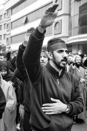 Istanbul, Turkey - November 13, 2013: The global mourning ceremony of Ashura. Karbala Martyrs Commemoration in Arenamega. Thousands of Jaferies in Turkey joined the Karbala mourning ritual where Prophet Muhammad's grandson Imam Hussain and 72 others were のeditorial素材
