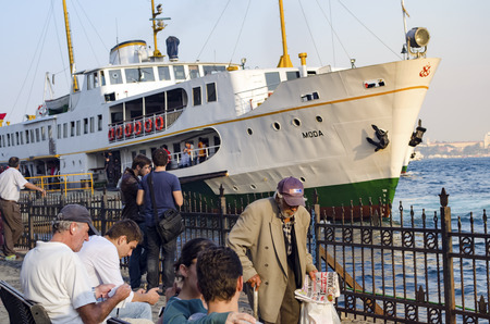 Istanbul, Turkey - October 2, 2012: Ferry in Karakoy pier. Port looks everyday life. Istanbul Ferries continue to serve as a key public transport link for many Thousands of commuters, tourists and vehicles per day.のeditorial素材