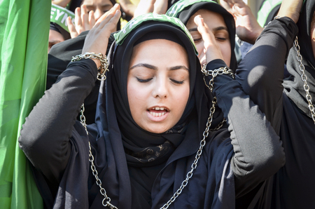 Istanbul, Turkey - October 11, 2016: Muslims worldwide marks Ashura Istanbul Shiite community. Turkish Shia Muslims mourning for Imam Hussain. Caferis take part in a mourning procession marking the day of Ashura in Istanbul's Kucukcekmece district, Turkeyのeditorial素材