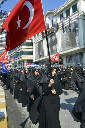 Istanbul, Turkey - October 11, 2016: Turkish Shia women takes part in an Ashura parade in Istanbul's district of Kucukcekmece. Turkish Shia Muslims mourning for Imam Hussain. Caferis take part in a mourning procession marking the day of Ashura in Istanbulのeditorial素材