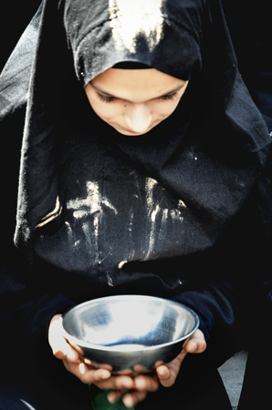 Istanbul, Turkey - October 11, 2016: Children takes part in an Ashura ceremony. In the place named Karbala (today within the borders of Iraq) which at that time was a desert some of the victims left for days to die of thirst were children. These are the cのeditorial素材