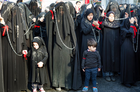 Istanbul, Turkey - October 11, 2016: Turkish Shia women takes part in an Ashura parade in Istanbul's...