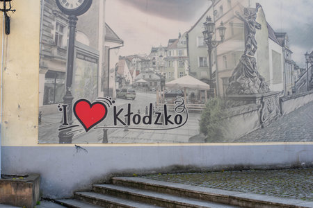 The city architecture of Klodzko, Poland, featuring a blend of medieval buildings, charming streets, and vibrant facades that reflect its rich history.の写真素材