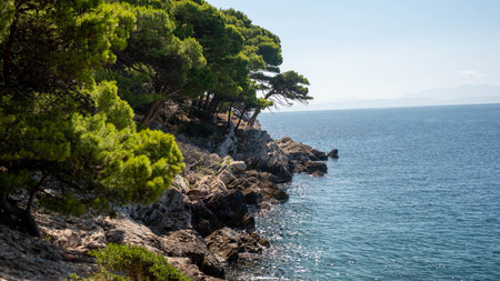 Seaside with cliffs and azure sea, Dalmatian region, Makarska Riviera, Croatia.の写真素材