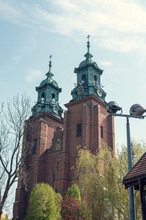 Historic Cathedral of Gniezno in Greater Poland, Poland, showcasing Gothic architecture and cultural heritage.の写真素材