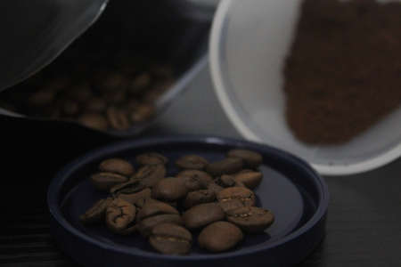 Whole beans and ground coffeeの写真素材