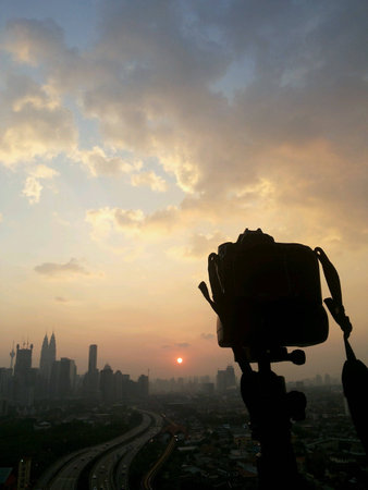 Camera shooting kuala lumpur city skyline
