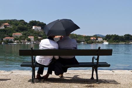 Couple on a benchの写真素材