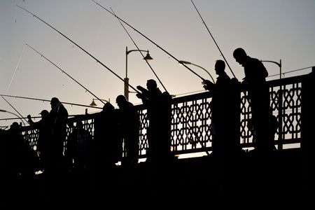 Silhouette of fishermenの写真素材