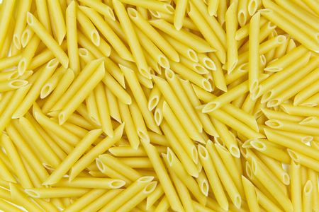 Closeup of uncooked italian pasta - penneの写真素材