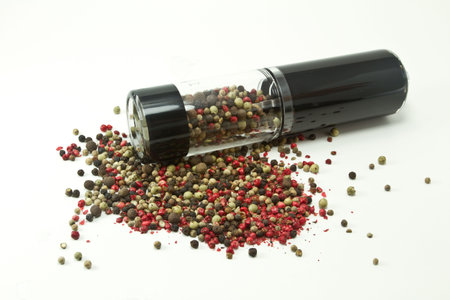 Closeup of mixed pepper isolated on white background