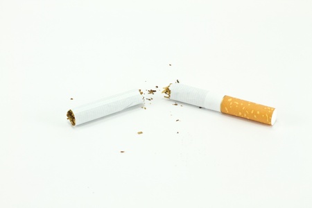 Isolated Broken cigarette on a white backgroundの写真素材