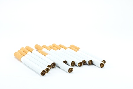 a bunch of cigarettes isolated on whiteの写真素材