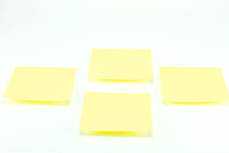 Yellow memo stick isolated on white background