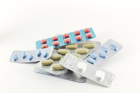 Packs of pills isolated on white background.
