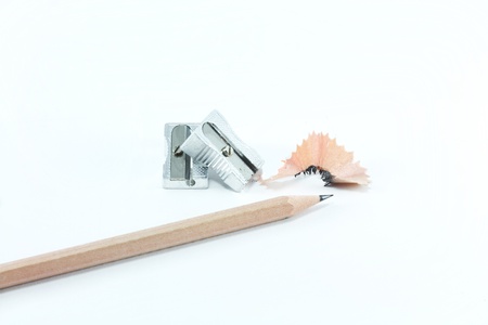 Pencil with sharpening shavings on white backgroundの写真素材